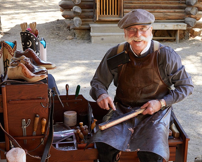 D.W. Frommer demonstrates how he makes boots by hand.