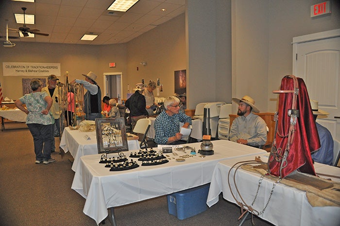 Folk Arts Market and Demonstrations at Annual Migratory Bird Festival (Pat Horlacher, silversmith pictured right; Douglas Manger, folklorist pictured left)
