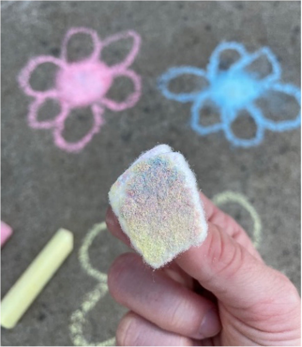 flowers drawn on ground with sidewalk chalk