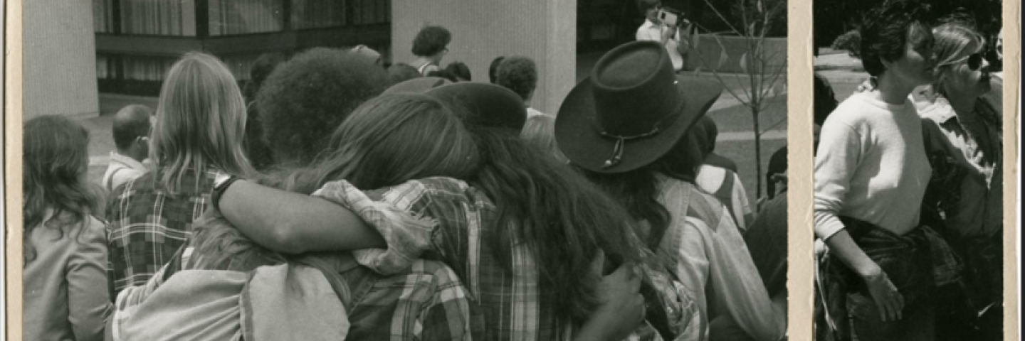 Black and white photo of several students in 1977 celebrating Stonewall Day at UO