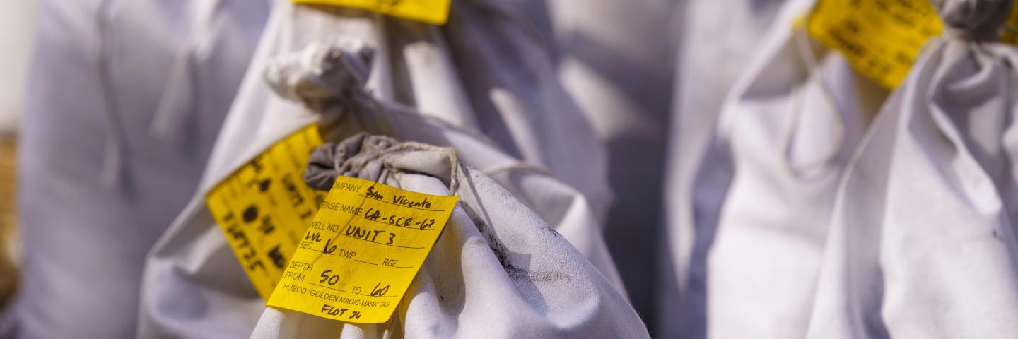 bags of soil samples labeled for floating