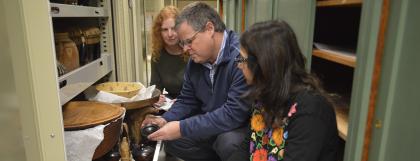 Guest curator Stephen Wooten examines food utensils from around the world