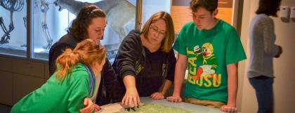 Family in exhibit hall