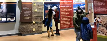 Visitors in the museum exhibit hall