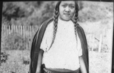 Woman with brass arm ornaments (MNCH Image 12-1673)