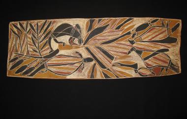 Woman in a jungle with turkeys and lizards