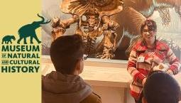 Tour guide guiding a tour in the museum