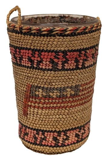 Drinking glass with a basket decorated with a stylized American flag.